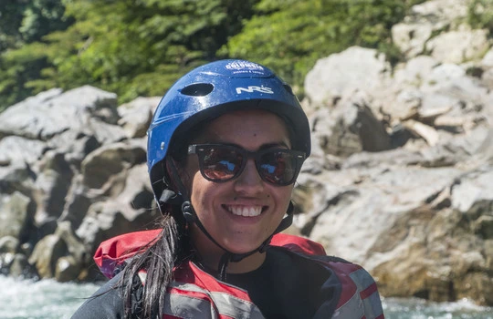 Smiling woman by the Samaná River