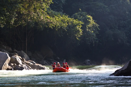 Raft with clients just after a small rapid on the Samana river in Antioquia