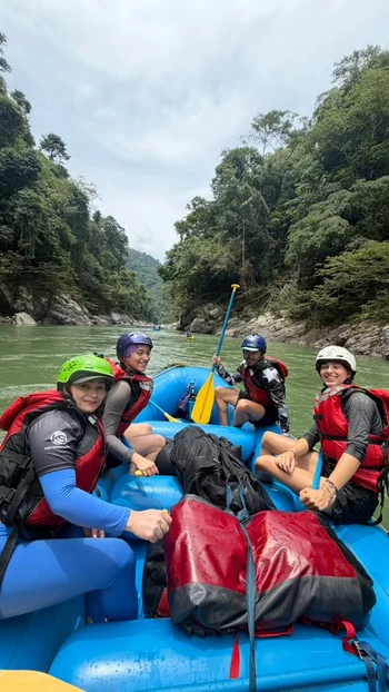 Happy group in a raft in a samana expedition on the remote Samana river